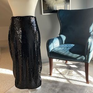 Black sequence pencil midi skirt. Excellent condition. Size Large 10/12